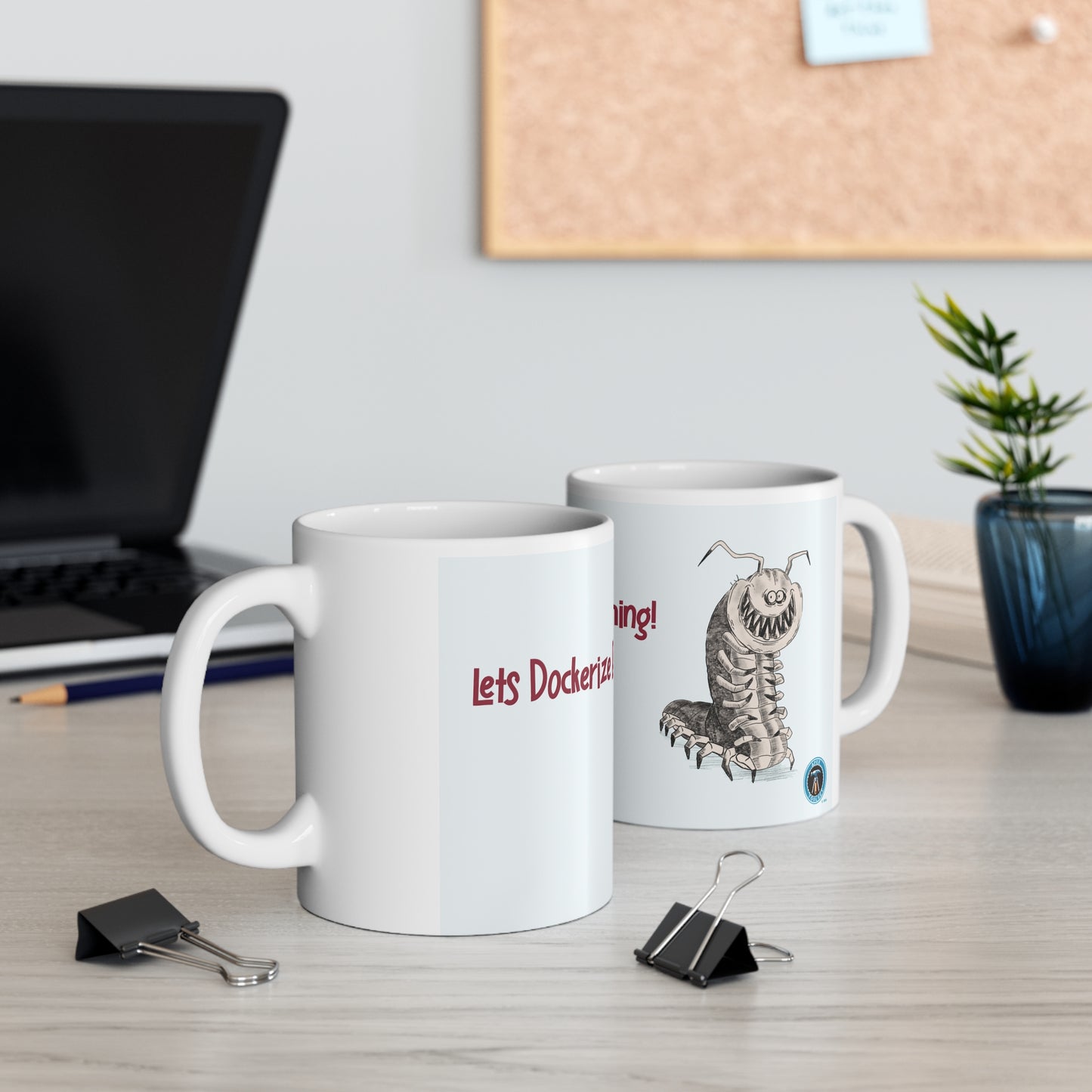 2 Let's Dockerize everything! cups on a desk with a laptop and cork board in the background