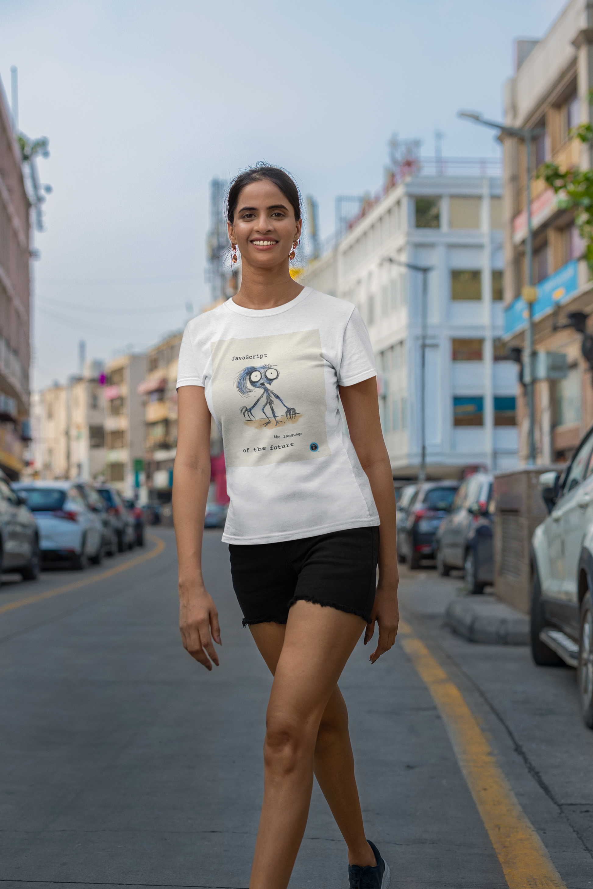 Woman strutting in the street with her JavaScript; language of the future t-shirt