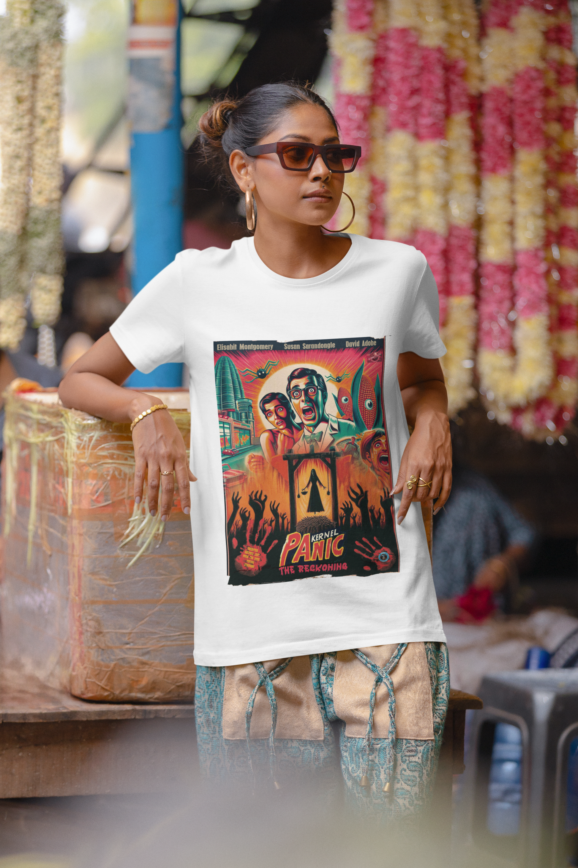 Woman relaxing in her Kernel Panic: the reckoning t-shirt at the market