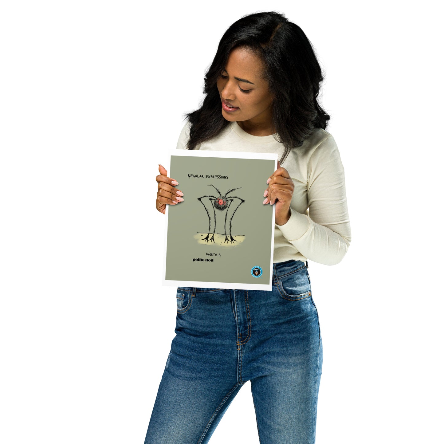 Woman in jeans and long sleeved t-shirt holding an 8" x 10" Worth a polite nod print